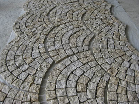 Mesh-backed Pavers