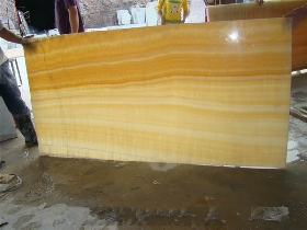 backlit honey onyx glass slabs