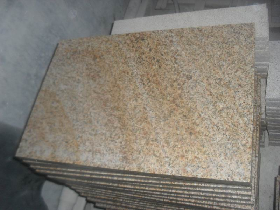 Light buff granite slab paving